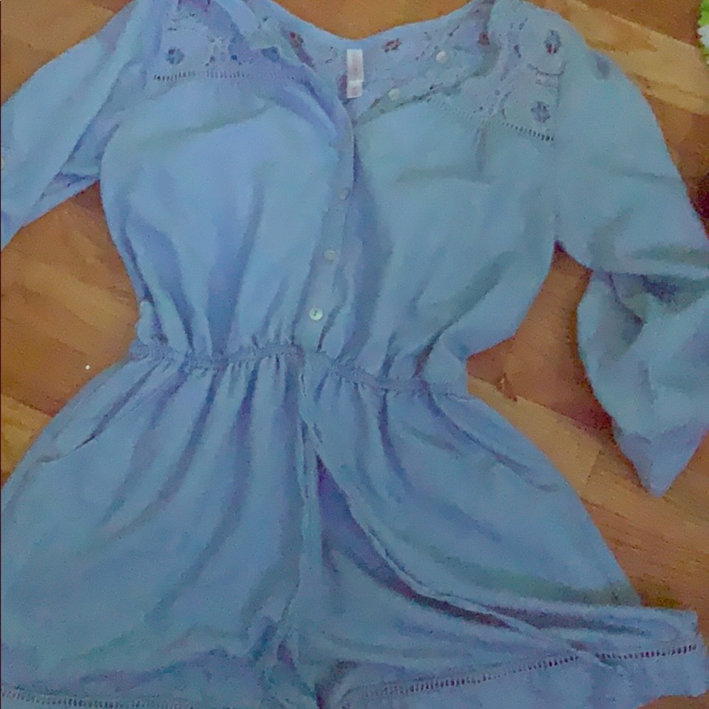 Sky blue romper buttoned up